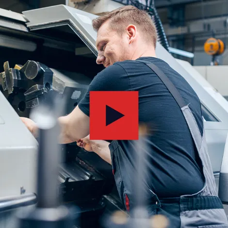 Extreme Precision Screw Products Employee Working a Lathe Click to Play Video Extreme Precision Screw Products Employee Working a Lathe Click to Play Video